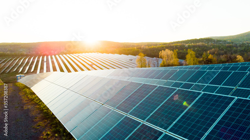 Solar panel cell on dramatic sunset sky background,clean Alternative power energy concept.