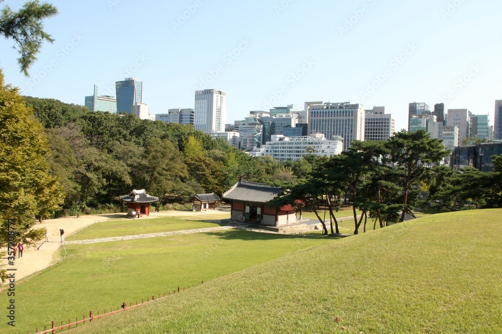 View of buildings with a park in Korea under the blue sky
