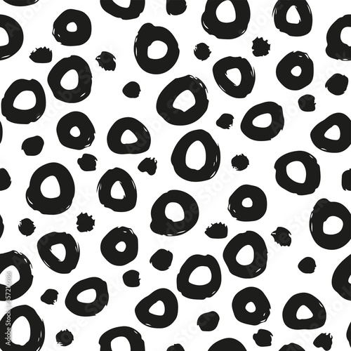Black ink bold circles isolated on white background. Abstract monochrome seamless pattern. Hand drawn vector flat graphic illustration. Texture.