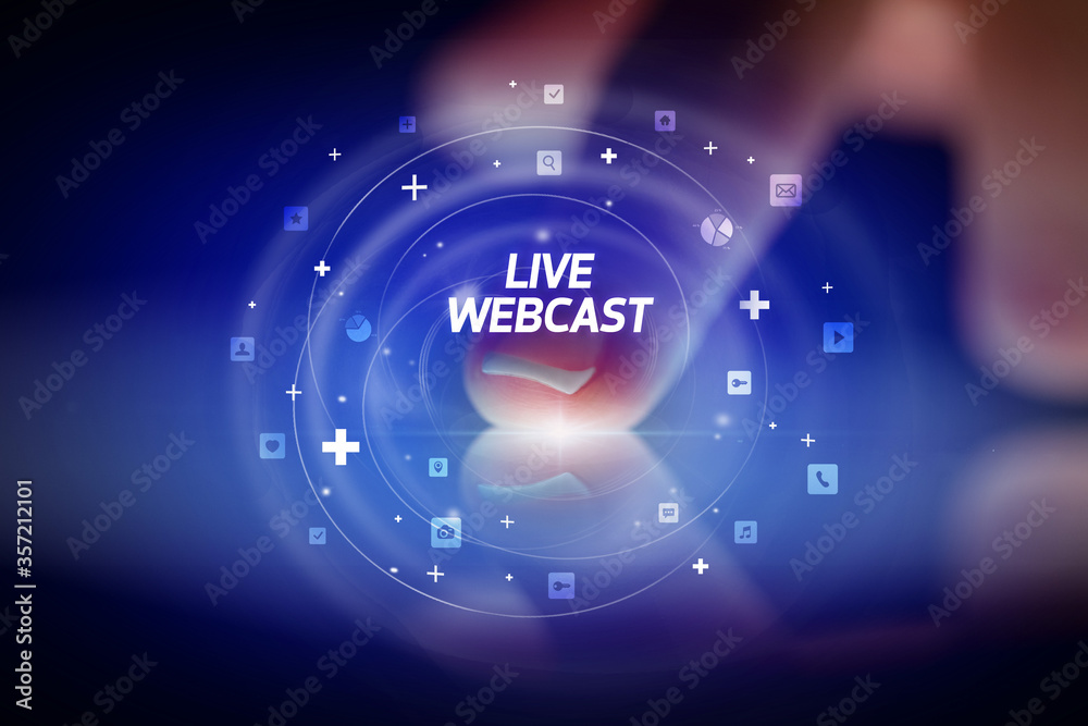 Finger touching tablet with social media icons and LIVE WEBCAST Finger touching tablet with social media icons and LIVE WEBCAST