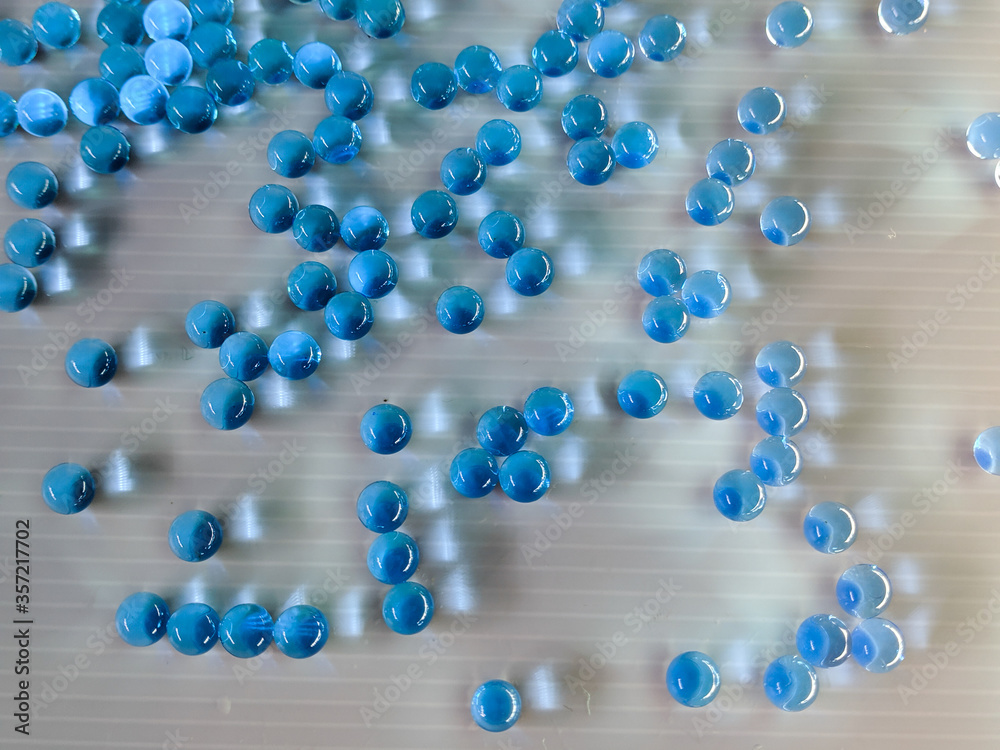 blue gel bullets and dark background blue gel bullets and dark background