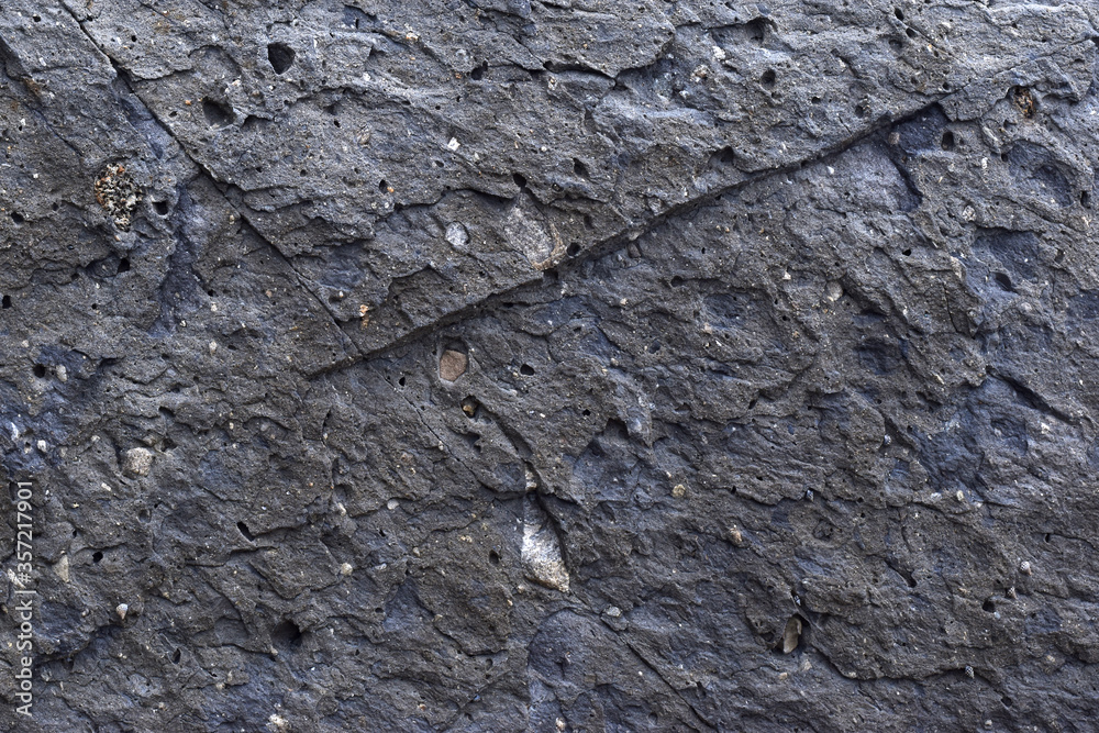Fototapeta premium Black sea stone slabs textured.