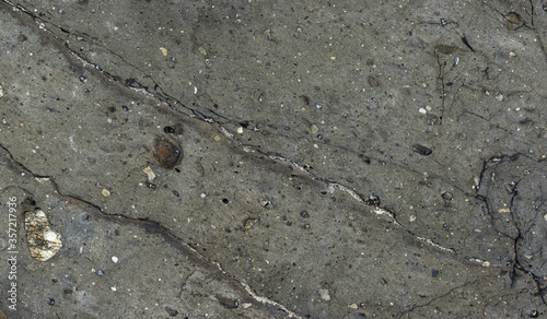 Black sea stone slabs textured.
