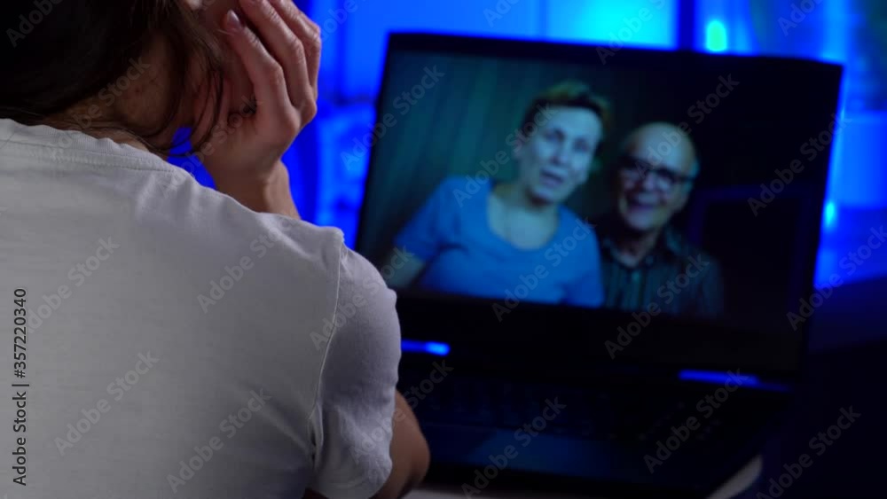 elderly parents are calling by video online to their adult daughter, self-isolation elderly parents are calling by video online to their adult daughter, self-isolation