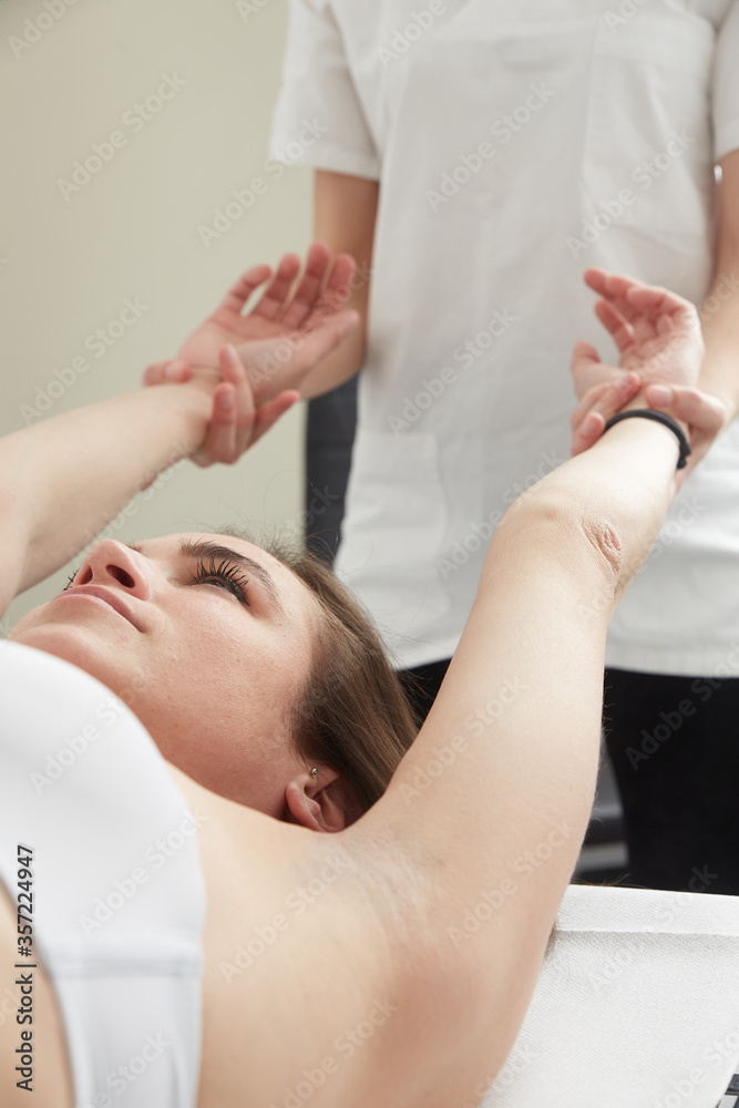 Female Enjoying Relaxing Massage In Cosmetology Spa Center