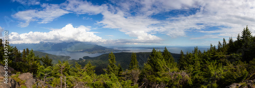 Fototapeta Naklejka Na Ścianę i Meble -  Beautiful Panoramic Canadian Landscape view from top of Mt. Gardener Hike with Vancouver City in Background. Located in Bowen Island, British Columbia, Canada.