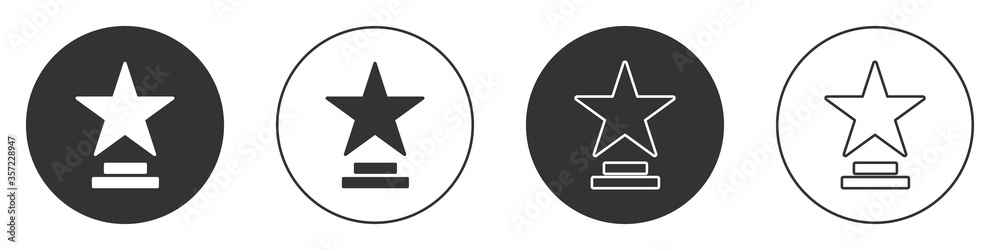 Black Movie trophy icon isolated on white background. Academy award icon. Films and cinema symbol. Circle button. Vector Illustration. Black Movie trophy icon isolated on white background. Academy award icon. Films and cinema symbol. Circle button. Vector Illustration.