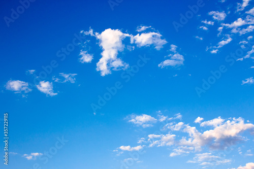 bright puffy clouds on the azure sky. wonderful nature background in summertime