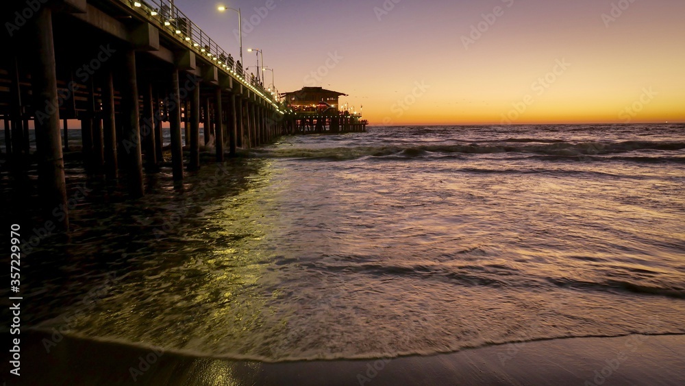 Sunset over pier in Venice Beach Los Angeles