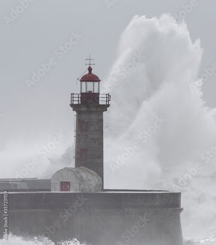 10 Meters Big Waves over the "Felgueiras" Lighthouse in Oporto, Portugal.