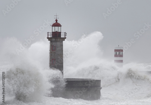 10 Meters Big Waves over the "Felgueiras" Lighthouse in Oporto, Portugal.