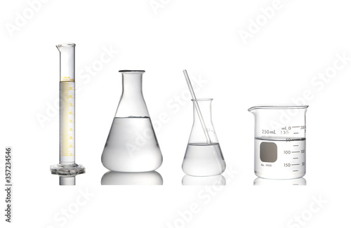 Group of laboratory glassware with reflection isolated on white background.