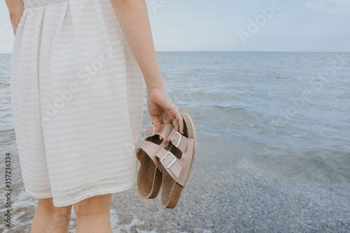 woman with beach slippers 