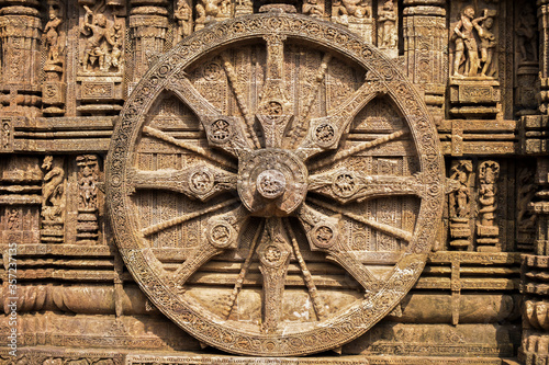 ancient wheel of a chariot at konark sun temle at orissa photo