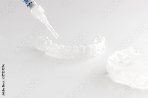 Teeth tray for dental whitening opalescence and bleaching gel syringe
