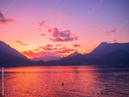 Fototapeta Naklejka Na Ścianę i Meble -  Amazing sunset behind Alps mountains and Como lake, Italy.