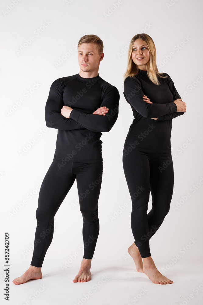 Guy and girl in thermal underwear on a white background Guy and girl in thermal underwear on a white background