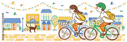 夏　街並み　自転車　カップル