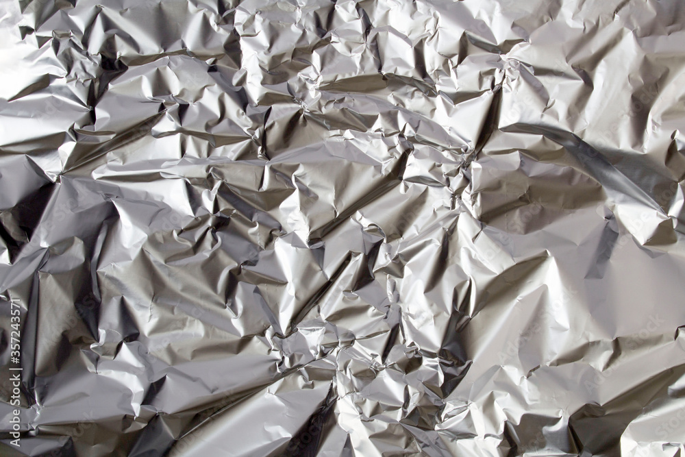 Silver shiny background. Copy space. Closeup. Silver shiny background. Copy space. Closeup.
