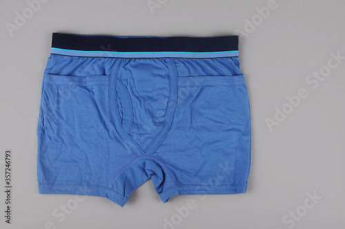 Boy's underwear isolated on grey background