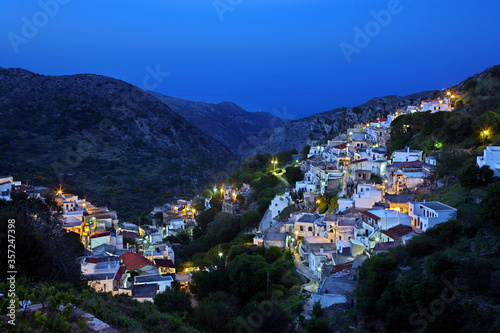 NAXOS ISLAND, GREECE. Night view of Koronos village, one of the most beautiful mountainous villages of Naxos island, Cyclades.