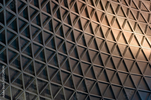 Architectural geometric triangular pattern with graduated lighting