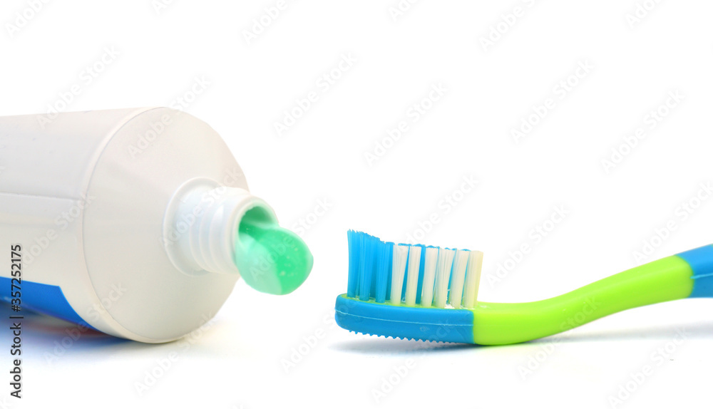Tube of toothpaste and toothbrush. Isolated on a white. Tube of toothpaste and toothbrush. Isolated on a white.