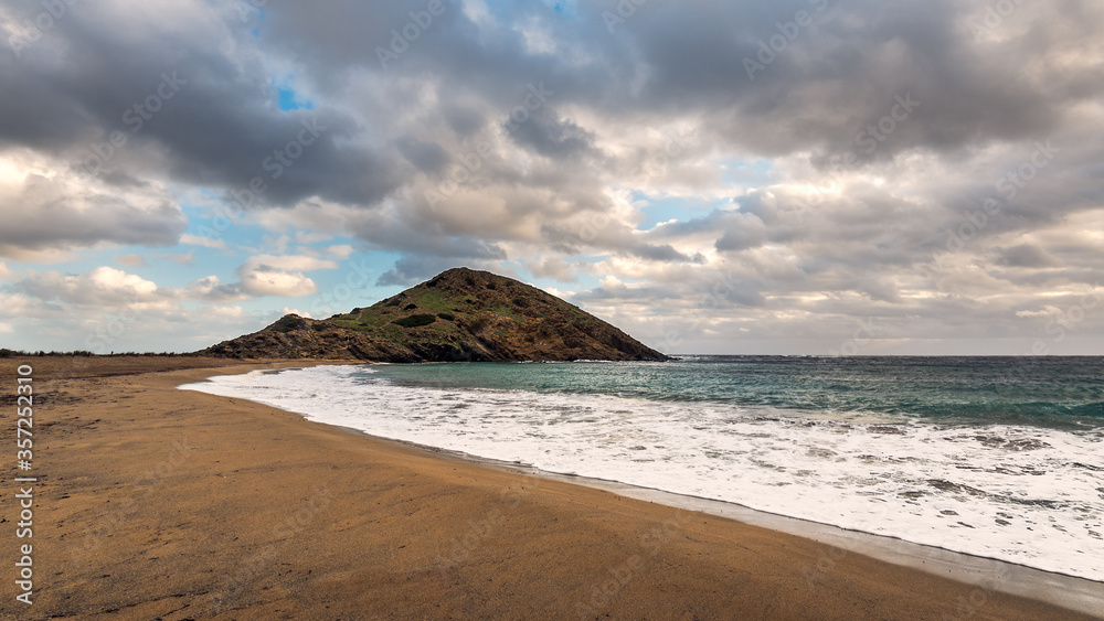 sa mesquida beach in a stormy day, abandoned paradise beach in Menorca, a Spanish Mediterranean island, after the covid 19 coronavirus crisis sa mesquida beach in a stormy day, abandoned paradise beach in Menorca, a Spanish Mediterranean island, after the covid 19 coronavirus crisis