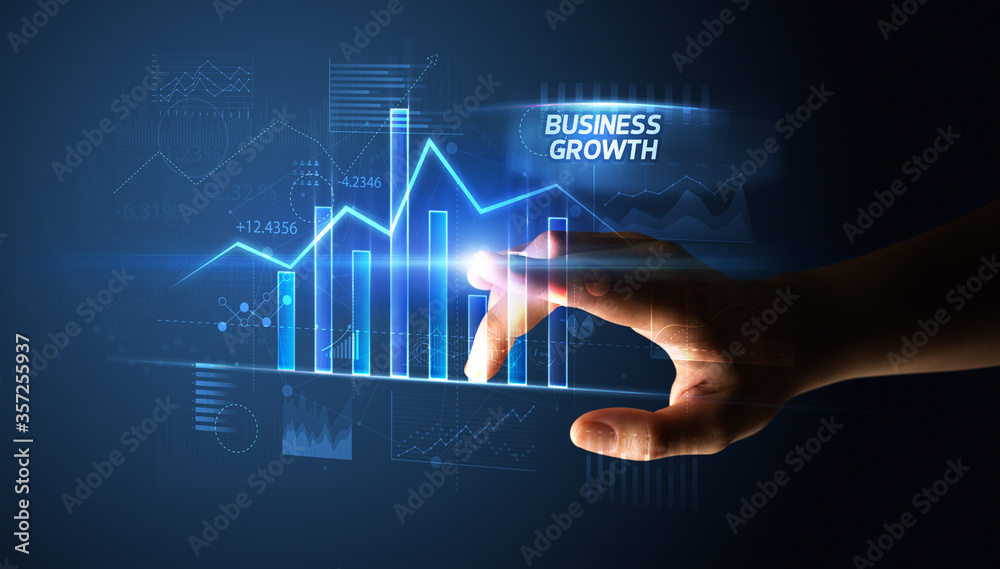 Hand touching BUSINESS GROWTH button, business concept Hand touching BUSINESS GROWTH button, business concept