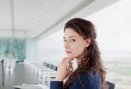 Portrait of serious businesswoman in conference room