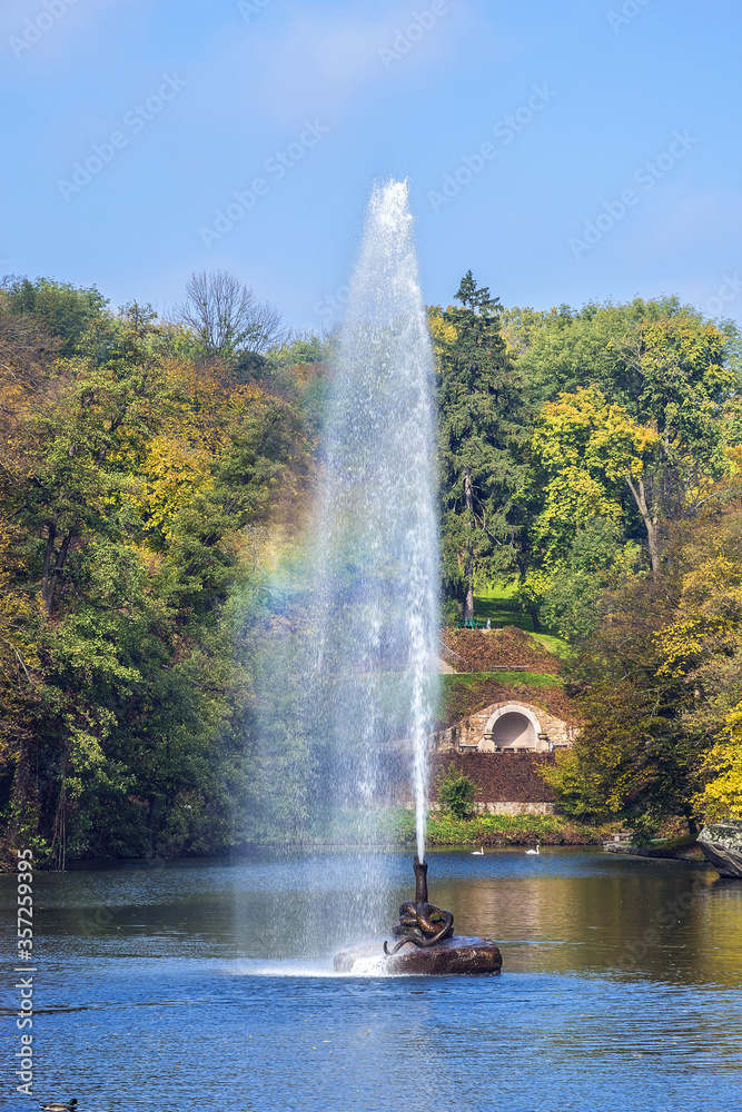 Fototapeta premium Golden autumn in Sofiyivsky Park (founded 1796 by Stanisław Potocki) - located in Uman, Cherkasy Oblast, Ukraine. Sofiyivka is a scenic landmark of world gardening design.