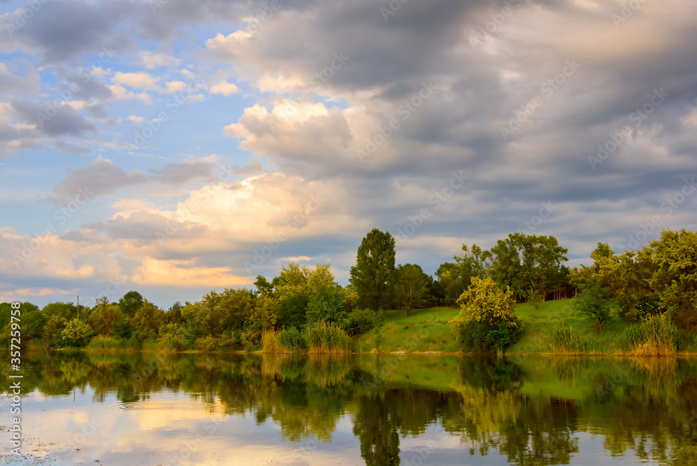outdoor countryside landscape, quiet summer river with forest on a coast outdoor countryside landscape, quiet summer river with forest on a coast