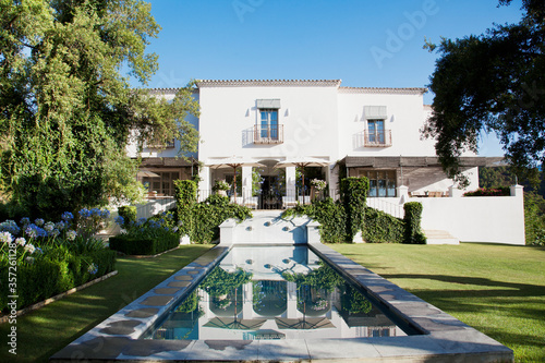 Luxury lap pool and Spanish villa © Martin Barraud/KOTO