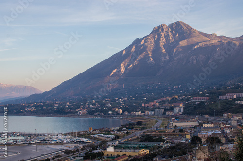 фотографія The port of Termini Imerese with the lights of the sunset on the Massif of Termi