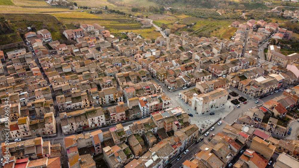 Obraz premium Aerial view of the center of Castellana Sicula, with the Church of San Francesco di Paola, in the Madonie Park