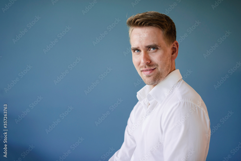 Confident businessman looking at camera Confident businessman looking at camera