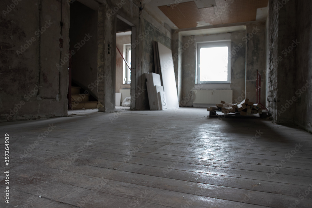 construction site within a residential town house, restoration works on real estate shown from the interior, no people construction site within a residential town house, restoration works on real estate shown from the interior, no people