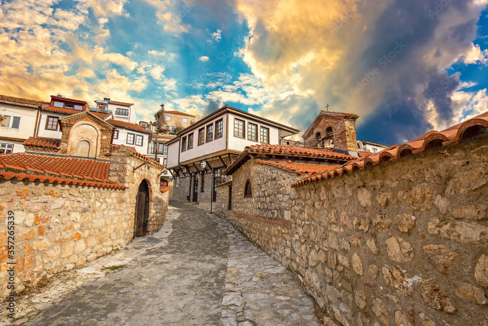 Narrow street in the old town of Ohrid on a beautiful sunset, North Macedonia