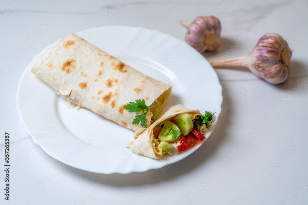 roll with tomatoes, cucumbers, garlic and herbs roll with tomatoes, cucumbers, garlic and herbs
