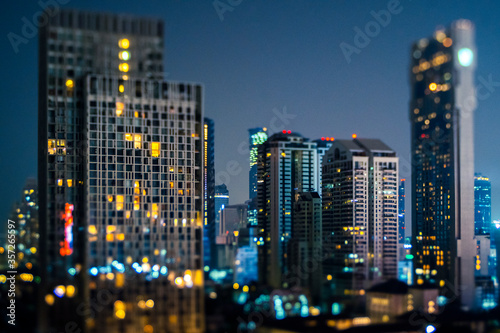 Thailand, Bangkok, Tilt shift of downtown skyscrapers at night