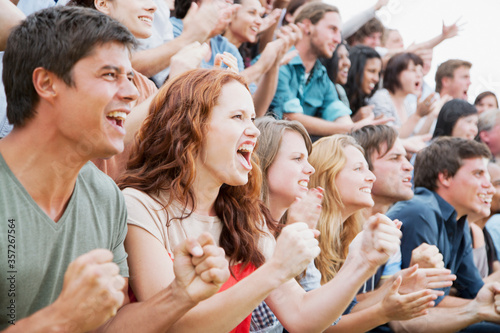 Fotografie Fans cheering in crowd