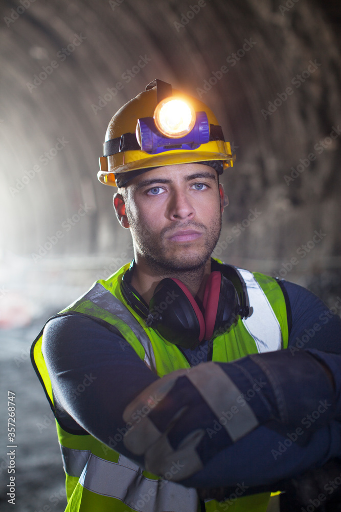 Fototapeta premium Worker standing in tunnel