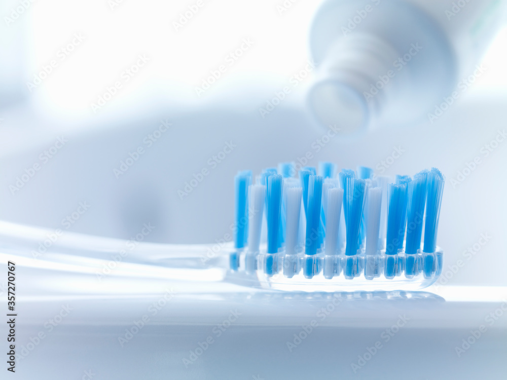 Close up of toothbrush and toothpaste Close up of toothbrush and toothpaste