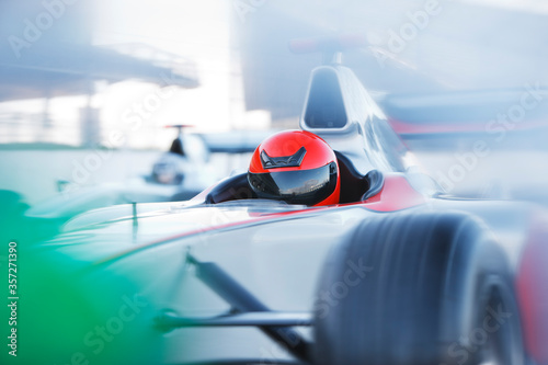 Race car driving on track © Tom Merton/KOTO