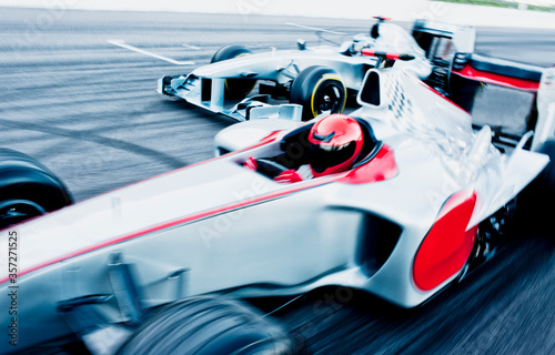 Race cars driving on track