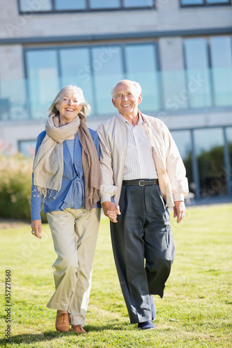 Older couple walking outdoors