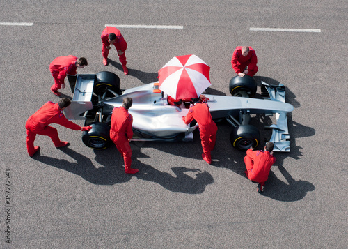Obraz na płótnie Racing team working at pit stop