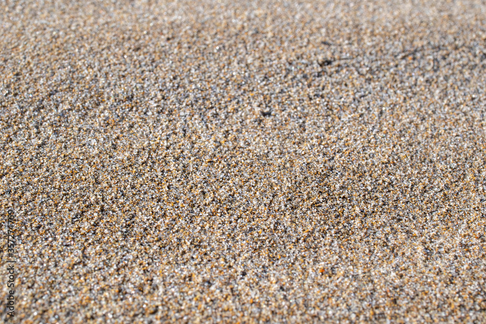 Sand texture and background.Sand on the beach in the background.Sandy beach for black background.Sand of a beach in summer.Copy space.Summer concept Sand texture and background.Sand on the beach in the background.Sandy beach for black background.Sand of a beach in summer.Copy space.Summer concept