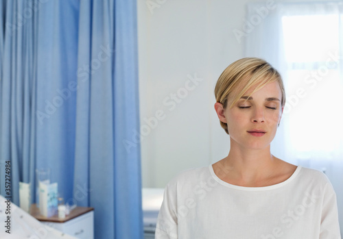 Patient sitting on bed in hospital room Free Download Patient sitting on bed in hospital room - GFXLoad