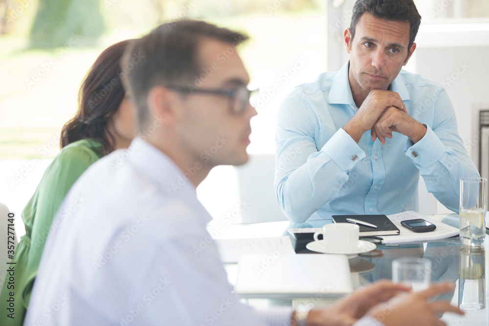 Business people talking in meeting Business people talking in meeting